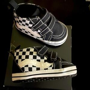 Black sneaker with black and white checkerboard
